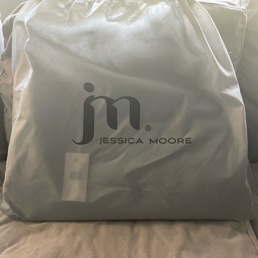 Jessica Moore-Nwt tags carry all bag.  Retail $119.